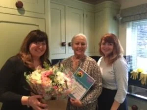 Maureen is awarded for listening and understanding.