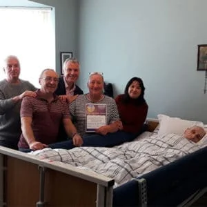 Colette with her palliative care customer and family