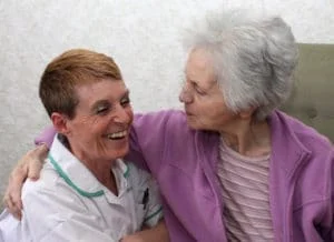 Care assistant Mandy with a customer