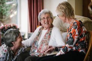 Dorothy with her daughter and carer
