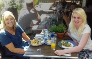 Jennifer enjoying dinner with her assistant