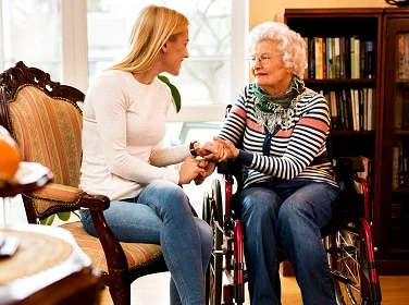 Lady speaking to grandmother