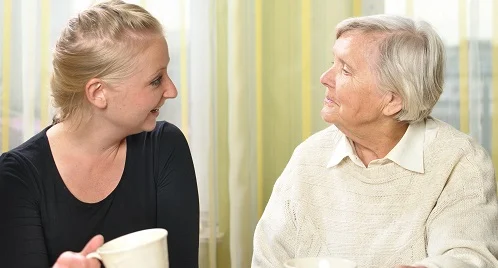 Elderly woman with her granddaughter