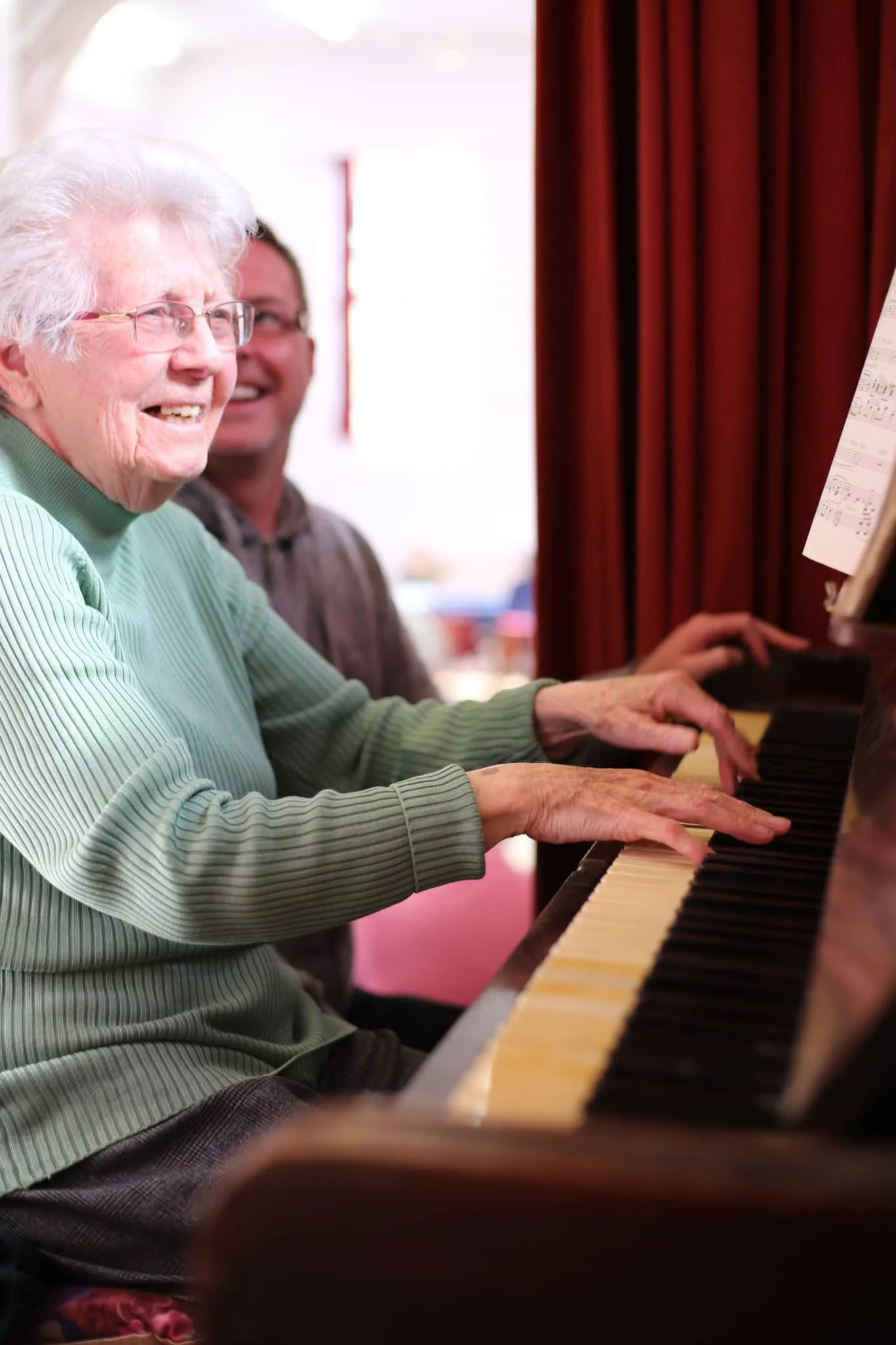 Gwenda playing the piano