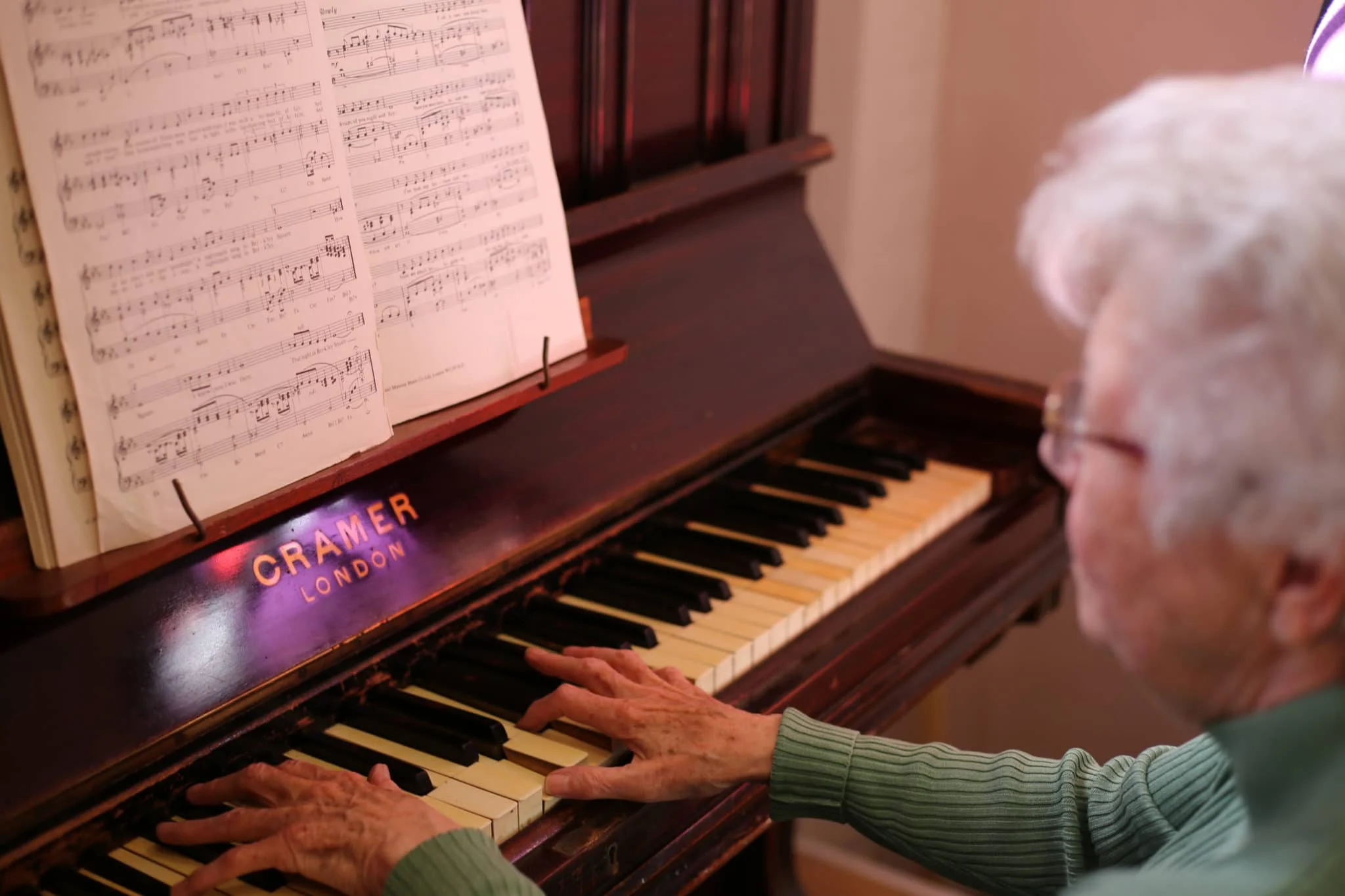 Gwenda playing the piano