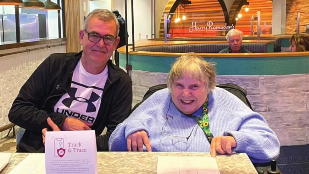 customer kathleen with carer in wheelchair