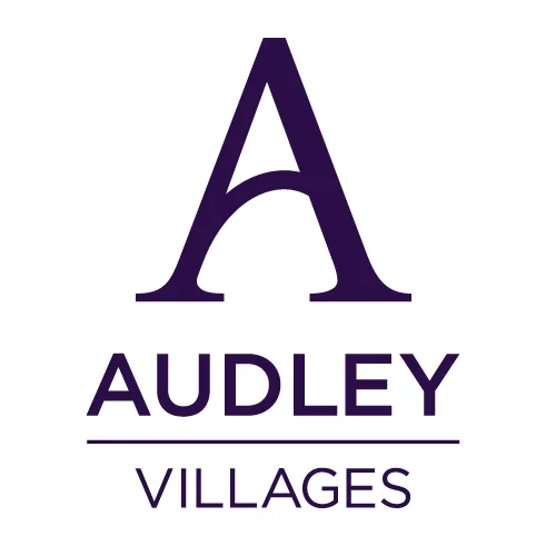 Large stylised letter A above the words AUDLEY VILLAGES in capital letters, with a horizontal line between AUDLEY and VILLAGES, all in dark purple on a white background.