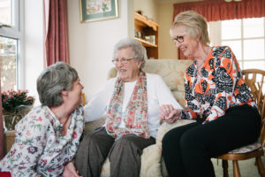 Dorothy with her daughter and live-in carer