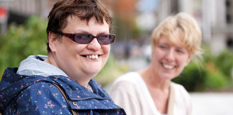 A lady with cerebral palsy and her live-in carer