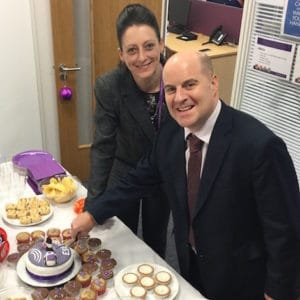 Ben Lee and Stacey Cole cut the cake for the Bristol branch