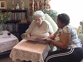 An elderly lady with her live-in carer