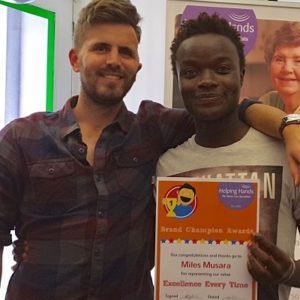 Miles, our carer of the month, with customer Dan