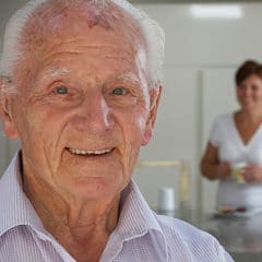 An elderly man with his live-in carer
